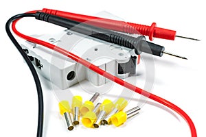 Tools and equipment for electrical work on a white background