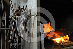 Tools and fire in a smithy