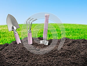 Tools garden soil on nature