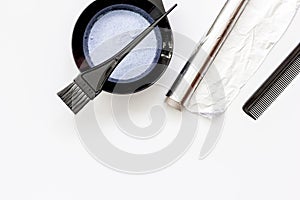 Tools for hair dye and hairdye top view white background