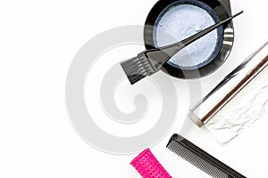 Tools for hair dye and hairdye top view white background