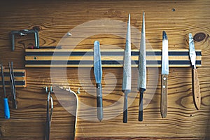 Tools for instruments on the wall at craftman workshop