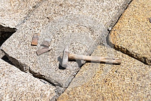 tools for stone masonry work with granite ashlars photo