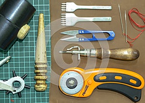 Tools and materials for work with genuine leather