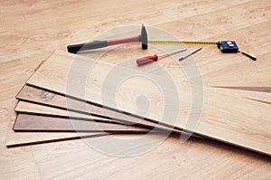 Tools for mounting laminated floor photo