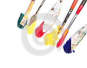 Tools with paints on white background