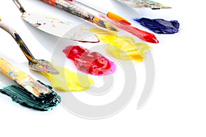 Tools with paints on white background