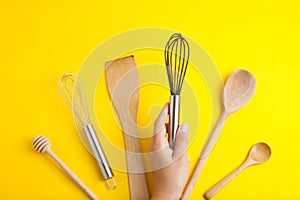 Tools pastry kitchen utensile for cooking dessert, over yellow background with copy space, still life. Top view. photo