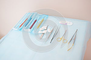 Tools for the periodontist.Scalers in stomatology.Multi-colored dental curettes. Curettes for dental fillings. Dental probes. photo
