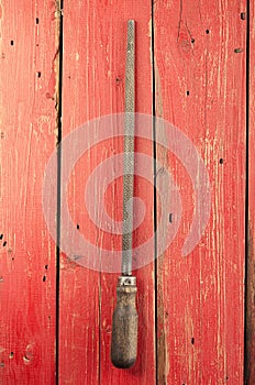 Tools. Rasp on wooden background. Ready to work.