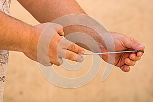 Tools for repair and building. Hand holding a ruler on blurred background