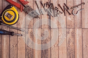 Tools for repair on a wooden surface