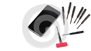 Tools for repairing a smartphone or tablet or cell phone. Modern smartphone, copy space. Close-up, copy space, white background,