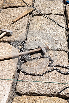tools for stone construction with granite ashlars photo