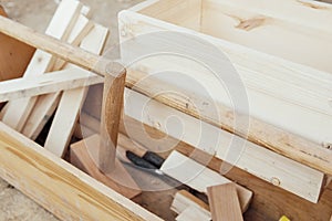 Tools to work with the carpenter`s wood on the table as a background