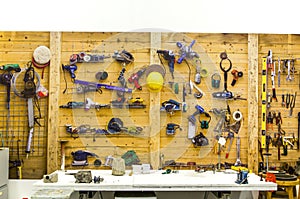 Tools on the wood wall of workshop