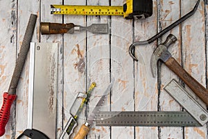 Many assorted hand tools for rustic jobs