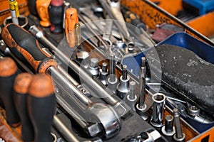 Toolset with ring spanners, screwdrivers, wrenches, bit socket set.
