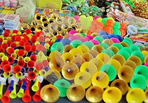 Toot horns for kids, for sale in Polonnaruwa Sunday fair.