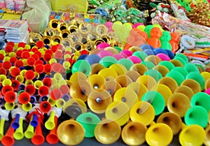 Toot horns for kids, for sale in Polonnaruwa Sunday fair. photo