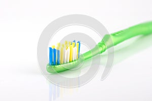 Tooth-brush with green handle