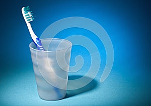 Tooth brush in matte plastic glass