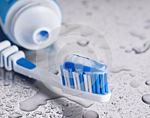 Tooth brush and paste photo