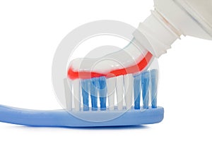 Tooth-brush and paste isolated over white