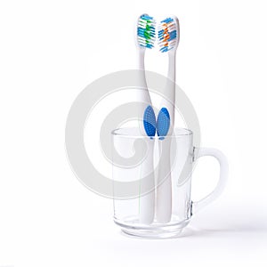 Tooth brush twins in glass