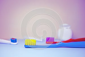 Tooth brushes lying on the table. Dental hygiene concept