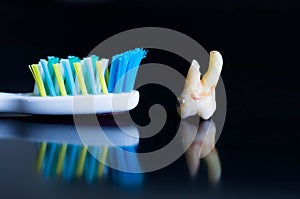 Tooth decay versus toothbrush photo