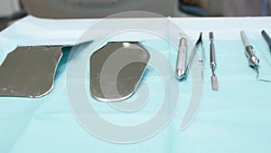 tooth extraction devices on the dentist's table