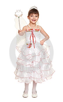 Tooth fairy girl dressed in white with wings