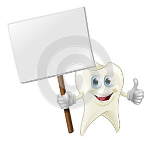 Tooth man holding a sign