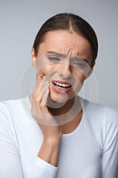 Tooth Pain. Beautiful Woman Feeling Strong Pain, Toothache