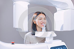 Tooth x-ray in the dental office. Young girl at the dentist`s appointment