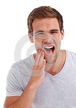 Toothache, pain and man with dental crisis, health and tooth decay with problem on white background. Oral hygiene