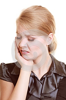 Toothache. Young woman suffering from tooth pain isolated