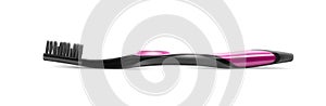 Toothbrush black with a rose color element on a transparent background