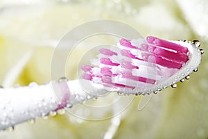 Toothbrush closeup with water