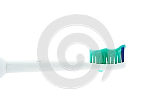 Toothbrush head with toothpast from the side