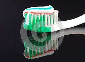 Toothbrush and paste