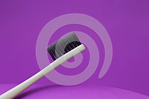 Toothbrush on pink background