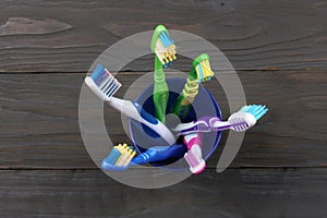 Toothbrush tooth-brush on wood table. top view