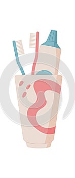 Toothbrush And Toothpaste In Cup