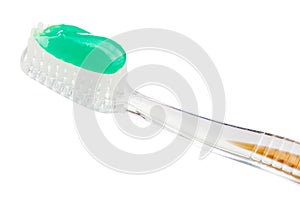 Toothbrush and toothpaste on isolated white background