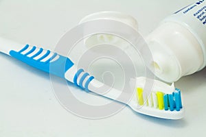 Toothbrush and toothpaste tubes