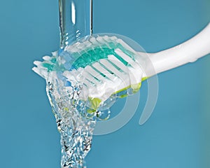 Toothbrush under running water