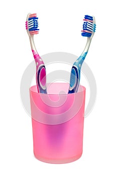 Toothbrushes in cup photo