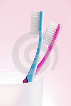 Toothbrushes in glass